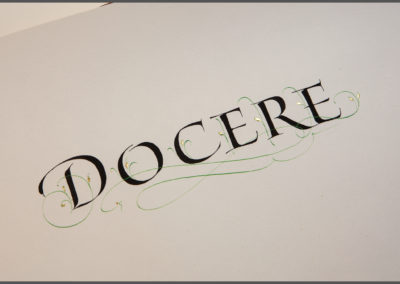 "Docere", calligraphy by John Stevens